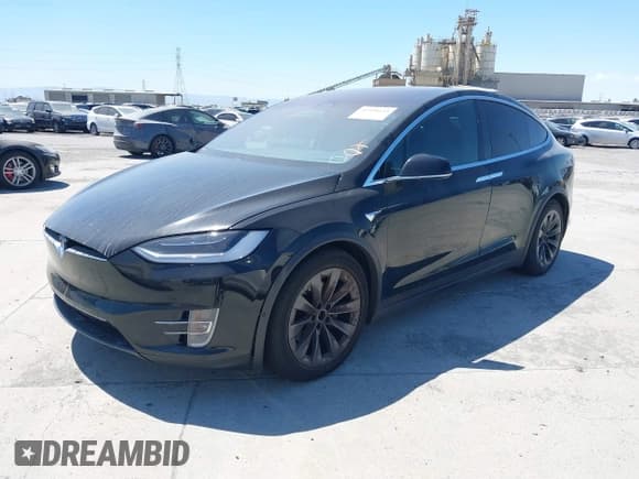 ✅ 2017 Tesla Model X 90D • VIN: 5YJXCAE24HF052234 • Lot: 42991643. Listed on IAAI with 129,767 mi. Free auction sales archive from the USA and detailed vehicle history report at DreamBid. Image 2.