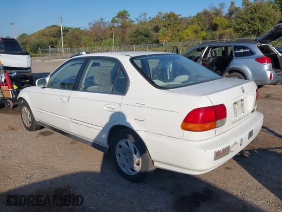✅ 1997 Honda Civic EX • VIN: 1HGEJ8545VL006137 • Лот: 43791413. Опубликован ранее на IAAI с пробегом 229 809 миль. Бесплатный доступ к архиву аукционных продаж из США и подробный отчёт об истории автомобиля на DreamBid. Изображение 3.