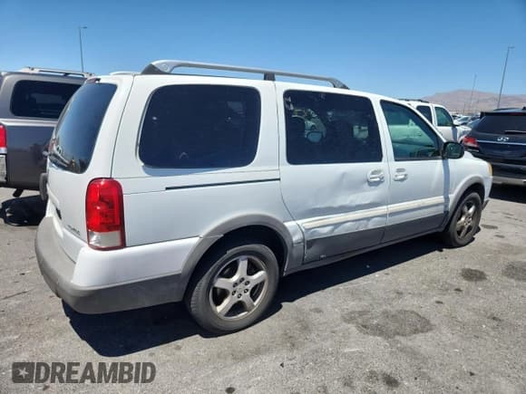 ✅ 2006 Pontiac Montana • VIN: 1GMDV33L66D127827 • Лот: 62368515. Опубликован ранее на Copart с пробегом 94 867 миль. Бесплатный доступ к архиву аукционных продаж из США и подробный отчёт об истории автомобиля на DreamBid. Изображение 3.