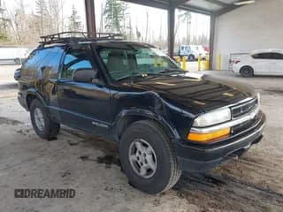✅ 1999 Chevrolet Blazer LS • VIN: 1GNCT18W3XK216840 • Lot: 41534524. Wystawiony na IAAI z przebiegiem 199 982 mil. Bezpłatny archiwum sprzedaży aukcyjnych z USA i szczegółowy raport historii pojazdu na DreamBid. Zdjęcie 1.