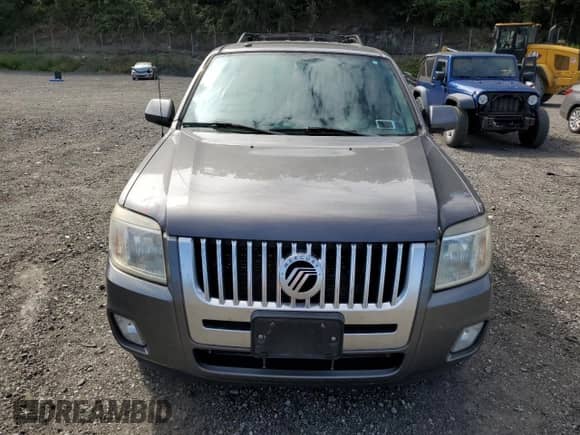 2010 Mercury Mariner Premier с VIN 4M2CN9HG3AKJ25661, выставлен на аукционе Copart как лот 69384945 с пробегом 154 199 миль миль и Списание • Salvage title. История ставок и продаж доступна на DreamBid. Изображение 5.