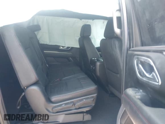 ✅ 2023 Chevrolet Suburban • VIN: 1GNSCEKT8PR130495 • Lot: 42572996. Listed on IAAI with 115,347 mi. Free auction sales archive from the USA and detailed vehicle history report at DreamBid. Image 8.