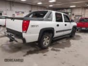 ✅ 2004 Chevrolet Avalanche Z71 • VIN: 3GNEK12T64G266712 • Lot: 43834160. Listed on IAAI with 392,391 mi. Free auction sales archive from the USA and detailed vehicle history report at DreamBid. Image 4.