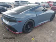 ✅ 2024 Nissan Z Nismo • VIN: JN1BZ4CH7RM360818 • Lot: 42733312. Listed on IAAI with 3,306 mi. Free auction sales archive from the USA and detailed vehicle history report at DreamBid. Image 4.