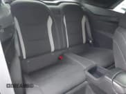 ✅ 2018 Chevrolet Camaro 1LT • VIN: 1G1FB3DSXJ0169583 • Lot: 41475295. Wystawiony na IAAI z przebiegiem 70 231 mil. Bezpłatny archiwum sprzedaży aukcyjnych z USA i szczegółowy raport historii pojazdu na DreamBid. Zdjęcie 8.