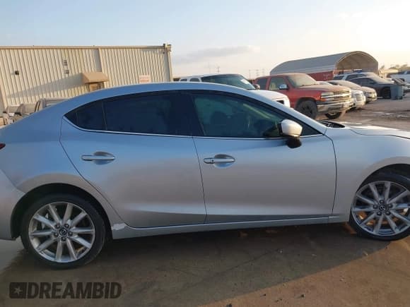 ✅ 2017 Mazda 3 Touring • VIN: 3MZBN1V78HM131348 • Лот: 43693967. Опубликован ранее на IAAI с пробегом 182 843 миль. Бесплатный доступ к архиву аукционных продаж из США и подробный отчёт об истории автомобиля на DreamBid. Изображение 13.