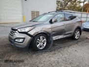 ✅ 2015 Hyundai Santa Fe • VIN: 5XYZWDLA7FG275479 • Lot: 91111245. Listed on Copart with 104,919 mi. Free auction sales archive from the USA and detailed vehicle history report at DreamBid. Image 1.