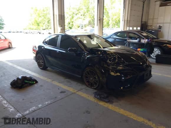 2023 Toyota Camry SE with VIN 4T1G11BK4PU088615, listed as a IAAI auction lot 42345340 with 35,468 mi miles and . Bid and sale history available at DreamBid. Image 1.