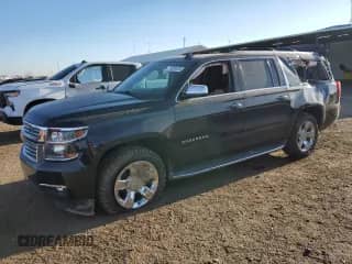 2016 Chevrolet Suburban LTZ z VIN 1GNSKJKC1GR238999, wystawiony jako Copart lot #71281475 z przebiegiem 100 657 mil mil oraz Szkoda całkowita • Salvage title. Historia ofert i sprzedaży dostępna na DreamBid. Obrazek 1.