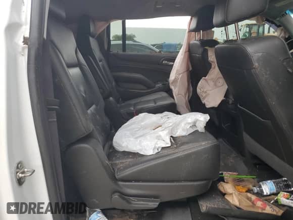 2017 Chevrolet Suburban LT z VIN 1GNSCHKC2HR299687, wystawiony jako Copart lot #64944284 z przebiegiem Nie podano mil oraz Szkoda całkowita • Salvage title. Historia ofert i sprzedaży dostępna na DreamBid. Obrazek 11.