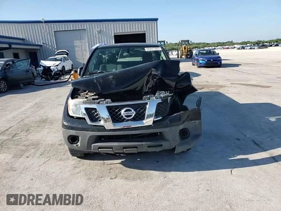 2015 Nissan Frontier S z VIN 1N6BD0CT6FN742561, wystawiony jako Copart lot #66447385 z przebiegiem 141 701 mil mil oraz Szkoda całkowita • Salvage title. Historia ofert i sprzedaży dostępna na DreamBid. Obrazek 13.