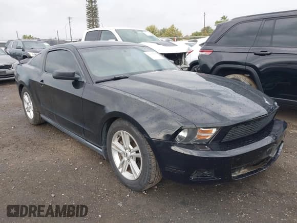 ✅ 2012 Ford Mustang Premium • VIN: 1ZVBP8AM4C5222131 • Lot: 43519035. Listed on IAAI with 124,983 mi. Free auction sales archive from the USA and detailed vehicle history report at DreamBid. Image 1.