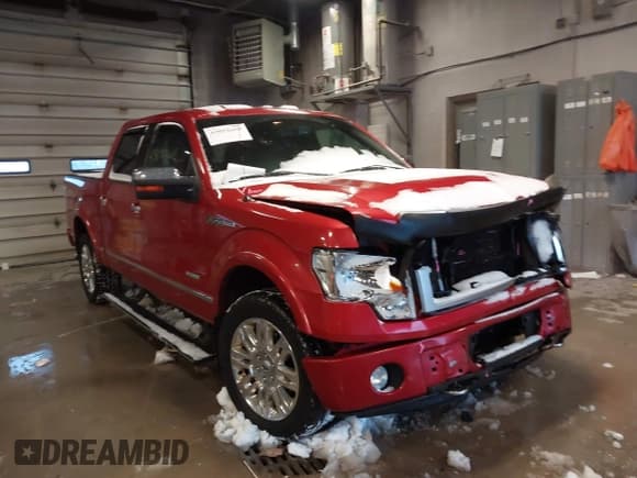 ✅ 2012 Ford F-150 Lariat • VIN: 1FTFW1ET5CFB02848 • Lot: 43892668. Listed on IAAI with 200,925 mi. Free auction sales archive from the USA and detailed vehicle history report at DreamBid. Image 1.