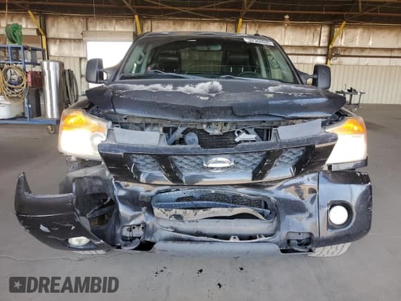 ✅ 2012 Nissan Titan Pro-4X • VIN: 1N6AA0ECXCN323965 • Лот: 92308695. Опубликован ранее на Copart с пробегом 130 702 миль. Бесплатный доступ к архиву аукционных продаж из США и подробный отчёт об истории автомобиля на DreamBid. Изображение 5.