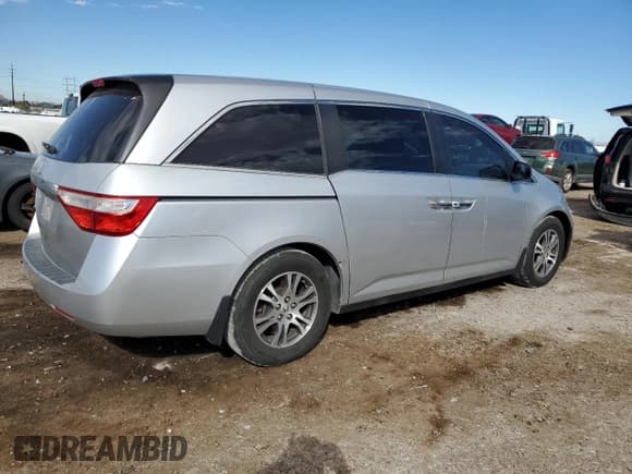 ✅ 2013 Honda Odyssey EX • VIN: 5FNRL5H42DB067483 • Lot: 84223245. Listed on Copart with 181,840 mi. Free auction sales archive from the USA and detailed vehicle history report at DreamBid. Image 3.