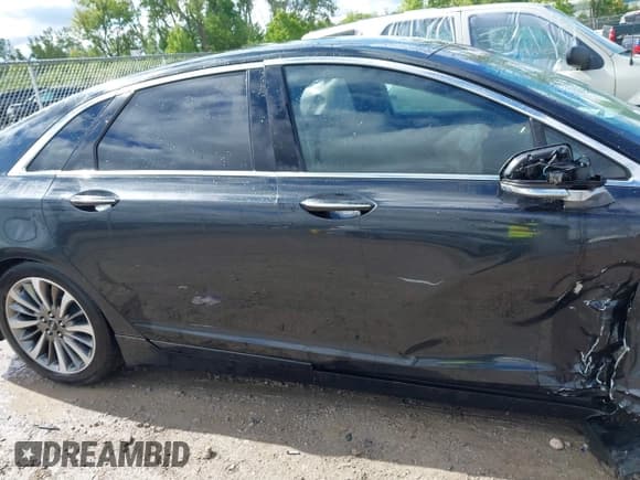 ✅ 2015 Lincoln MKZ • VIN: 3LN6L2G99FR625258 • Lot: 42308188. Wystawiony na IAAI z przebiegiem 186 911 mil. Bezpłatny archiwum sprzedaży aukcyjnych z USA i szczegółowy raport historii pojazdu na DreamBid. Zdjęcie 13.