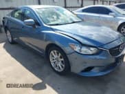 ✅ 2015 Mazda 6 i Sport • VIN: JM1GJ1U50F1191106 • Lot: 42887870. Listed on IAAI with 127,167 mi. Free auction sales archive from the USA and detailed vehicle history report at DreamBid. Image 1.