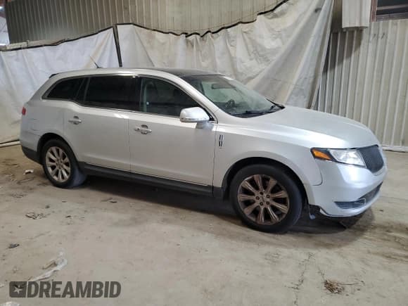 ✅ 2016 Lincoln MKT • VIN: 2LMHJ5FK7GBL00410 • Лот: 80105845. Опубликован ранее на Copart с пробегом 303 630 миль. Бесплатный доступ к архиву аукционных продаж из США и подробный отчёт об истории автомобиля на DreamBid. Изображение 4.
