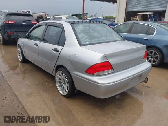 ✅ 2003 Mitsubishi Lancer ES • VIN: JA3AJ26E43U038813 • Лот: 41778956. Опубликован ранее на IAAI с пробегом 150 764 миль. Бесплатный доступ к архиву аукционных продаж из США и подробный отчёт об истории автомобиля на DreamBid. Изображение 3.