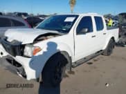 ✅ 2020 Nissan Frontier SV • VIN: 1N6ED0EA9LN728299 • Lot: 43657712. Listed on IAAI with 127,885 mi. Free auction sales archive from the USA and detailed vehicle history report at DreamBid. Image 2.
