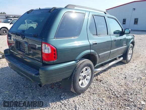 ✅ 2004 Isuzu Rodeo S • VIN: 4S2CK58Y544305012 • Lot: 43027958. Listed on IAAI with 125,526 mi. Free auction sales archive from the USA and detailed vehicle history report at DreamBid. Image 4.