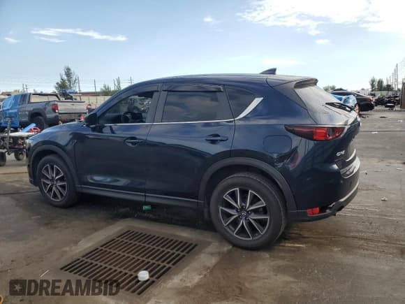 ✅ 2018 Mazda CX-5 Touring • VIN: JM3KFACM6J1448886 • Lot: 91935085. Wystawiony na Copart z przebiegiem 102 177 mil. Bezpłatny archiwum sprzedaży aukcyjnych z USA i szczegółowy raport historii pojazdu na DreamBid. Zdjęcie 2.