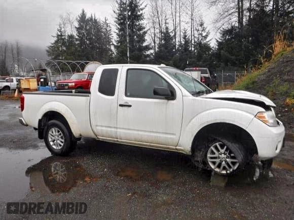 ✅ 2016 Nissan Frontier SV • VIN: 1N6AD0CW0GN725973 • Lot: 94764965. Listed on Copart with 145,752 mi. Free auction sales archive from the USA and detailed vehicle history report at DreamBid. Image 4.
