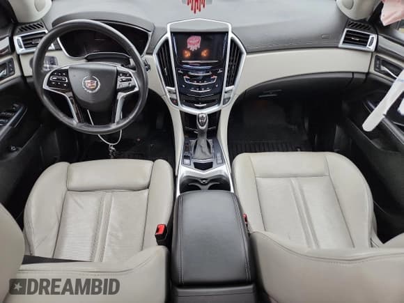 ✅ 2015 Cadillac SRX Performance Collection • VIN: 3GYFNFE31FS531821 • Lot: 68568995. Listed on Copart with 90,227 mi. Free auction sales archive from the USA and detailed vehicle history report at DreamBid. Image 8.