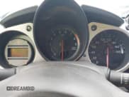 ✅ 2015 Nissan 370Z Nismo • VIN: JN1AZ4EH6FM444343 • Lot: 43274426. Wystawiony na IAAI z przebiegiem 50 998 mil. Bezpłatny archiwum sprzedaży aukcyjnych z USA i szczegółowy raport historii pojazdu na DreamBid. Zdjęcie 7.