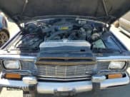 ✅ 1986 Jeep Grand Wagoneer • VIN: 1JCNJ15U0GT147723 • Lot: 69492824. Wystawiony na Copart z przebiegiem 98 610 mil. Bezpłatny archiwum sprzedaży aukcyjnych z USA i szczegółowy raport historii pojazdu na DreamBid. Zdjęcie 12.