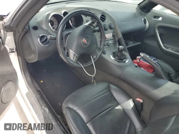 ✅ 2006 Pontiac Solstice • VIN: 1G2MB33B26Y105650 • Лот: 76115444. Опубликован ранее на Copart с пробегом Не указан. Бесплатный доступ к архиву аукционных продаж из США и подробный отчёт об истории автомобиля на DreamBid. Изображение 8.