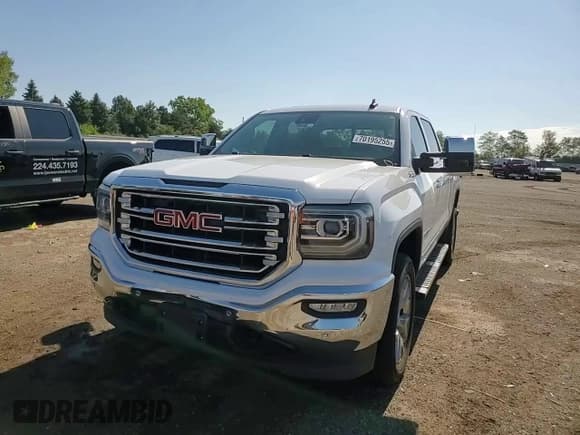 ✅ 2018 GMC Sierra 1500 SLT • VIN: 3GTU2NEC5JG571931 • Лот: 70195255. Опубликован ранее на Copart с пробегом 94 194 миль. Бесплатный доступ к архиву аукционных продаж из США и подробный отчёт об истории автомобиля на DreamBid. Изображение 13.