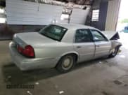 ✅ 2001 Mercury Grand Marquis LS • VIN: 2MEFM75W81X603977 • Лот: 64108865. Опубликован ранее на Copart с пробегом 187 153 миль. Бесплатный доступ к архиву аукционных продаж из США и подробный отчёт об истории автомобиля на DreamBid. Изображение 3.