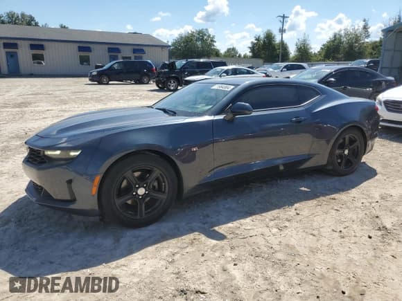✅ 2020 Chevrolet Camaro 1LT • VIN: 1G1FB1RS3L0101304 • Lot: 71984884. Listed on Copart with 137,779 mi. Free auction sales archive from the USA and detailed vehicle history report at DreamBid. Image 1.