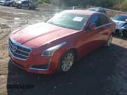 ✅ 2014 Cadillac CTS AWD • VIN: 1G6AW5SX4E0149936 • Lot: 43703151. Listed on IAAI with 108,671 mi. Free auction sales archive from the USA and detailed vehicle history report at DreamBid. Image 2.