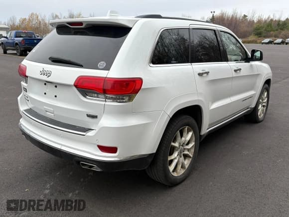 ✅ 2015 Jeep Grand Cherokee Summit • VIN: 1C4RJFJM8FC887279 • Lot: 92039305. Listed on Copart with 240,185 mi. Free auction sales archive from the USA and detailed vehicle history report at DreamBid. Image 4.