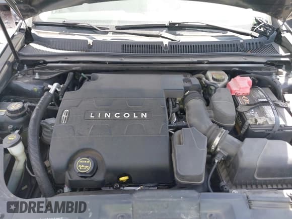 ✅ 2014 Lincoln MKS • VIN: 1LNHL9EK1EG606152 • Lot: 42104079. Listed on IAAI with 165,034 mi. Free auction sales archive from the USA and detailed vehicle history report at DreamBid. Image 10.