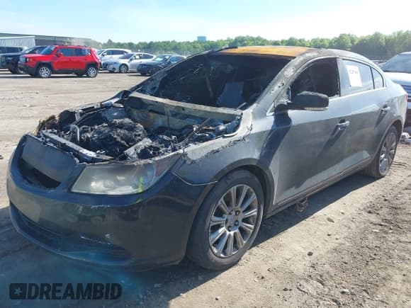 ✅ 2013 Buick LaCrosse Leather • VIN: 1G4GC5E31DF323770 • Lot: 42247069. Listed on IAAI with Not provided. Free auction sales archive from the USA and detailed vehicle history report at DreamBid. Image 2.