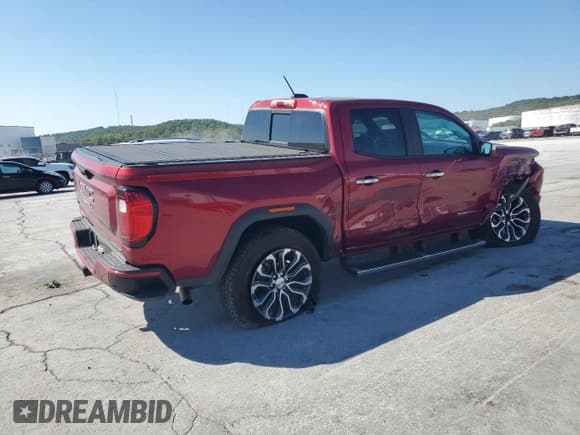 ✅ 2023 GMC Canyon 4WD Denali • VIN: 1GTP6FEK5P1241342 • Лот: 81638665. Опубликован ранее на Copart с пробегом 25 252 миль. Бесплатный доступ к архиву аукционных продаж из США и подробный отчёт об истории автомобиля на DreamBid. Изображение 3.