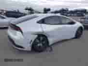 2024 Toyota Prius LE with VIN JTDACAAU6R3035544, listed as a IAAI auction lot 43413536 with 19,097 mi miles and . Bid and sale history available at DreamBid. Image 4.