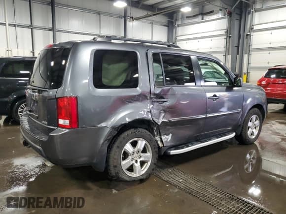 ✅ 2011 Honda Pilot EX-L • VIN: 5FNYF4H75BB051704 • Лот: 92026965. Опубликован ранее на Copart с пробегом 124 117 миль. Бесплатный доступ к архиву аукционных продаж из США и подробный отчёт об истории автомобиля на DreamBid. Изображение 3.