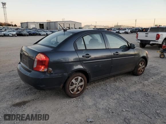 ✅ 2011 Hyundai Accent GLS • VIN: KMHCN4AC8BU605308 • Лот: 83220034. Опубликован ранее на Copart с пробегом 169 912 миль. Бесплатный доступ к архиву аукционных продаж из США и подробный отчёт об истории автомобиля на DreamBid. Изображение 3.