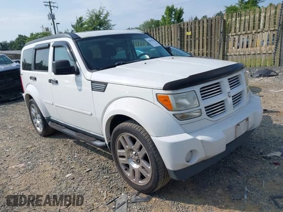 ✅ 2011 Dodge Nitro Heat • VIN: 1D4PU4GX0BW564036 • Lot: 42855542. Listed on IAAI with 156,845 mi. Free auction sales archive from the USA and detailed vehicle history report at DreamBid. Image 1.