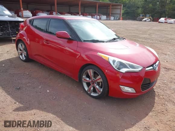 2013 Hyundai Veloster w/Black Int с VIN KMHTC6AD3DU099707, выставлен на аукционе IAAI как лот 43076379 с пробегом 128 517 миль миль и . История ставок и продаж доступна на DreamBid. Изображение 1.