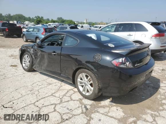 2008 Hyundai Tiburon GS с VIN KMHHM66D88U288354, выставлен на аукционе Copart как лот 59240385 с пробегом 106 687 миль миль и Списание • Salvage title. История ставок и продаж доступна на DreamBid. Изображение 2.