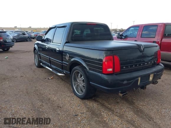 ✅ 2002 Lincoln Blackwood • VIN: 5LTEW05A02KJ01579 • Lot: 41408693. Listed on IAAI with Not provided. Free auction sales archive from the USA and detailed vehicle history report at DreamBid. Image 3.