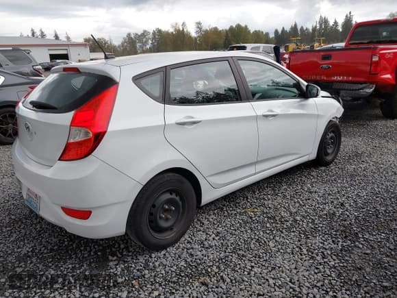 ✅ 2017 Hyundai Accent SE • VIN: KMHCT5AE0HU324058 • Lot: 43421624. Listed on IAAI with 87,466 mi. Free auction sales archive from the USA and detailed vehicle history report at DreamBid. Image 4.