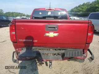 ✅ 2020 Chevrolet Colorado 4WD Z71 • VIN: 1GCGTDEN0L1200196 • Лот: 62996664. Опубликован ранее на Copart с пробегом 63 661 миль. Бесплатный доступ к архиву аукционных продаж из США и подробный отчёт об истории автомобиля на DreamBid. Изображение 6.