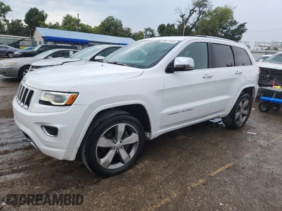 ✅ 2016 Jeep Grand Cherokee Overland • VIN: 1C4RJFCG5GC385029 • Lot: 80877655. Listed on Copart with 111,235 mi. Free auction sales archive from the USA and detailed vehicle history report at DreamBid. Image 1.