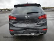 ✅ 2015 Hyundai Santa Fe Limited • VIN: 5XYZUDLA5FG304905 • Лот: 79820484. Опубликован ранее на Copart с пробегом 39 305 миль. Бесплатный доступ к архиву аукционных продаж из США и подробный отчёт об истории автомобиля на DreamBid. Изображение 6.
